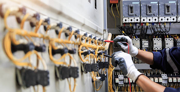 Professional Electrician technician working in Adel, IA
